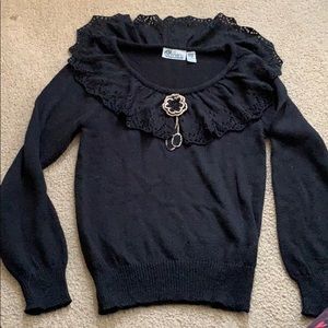 Black sweater with gold accent